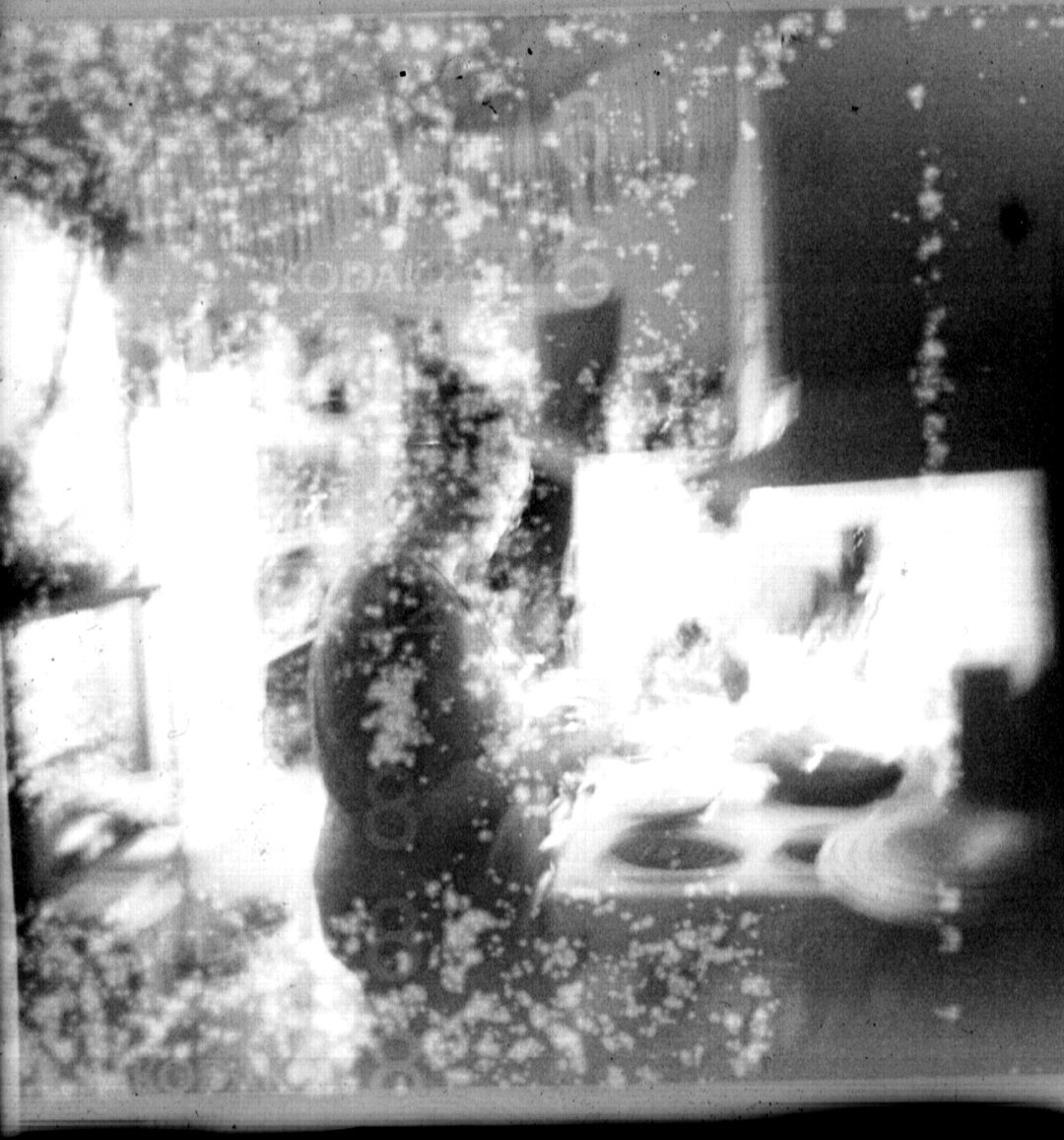 fucked up photo of my partner from the roll of film that was in my holga when i bought it. holga 120cfn kodak tmax