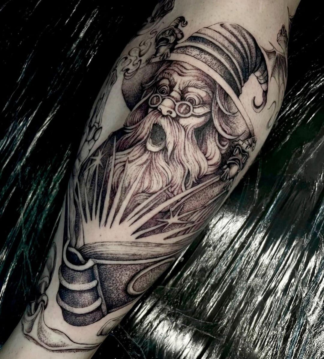 Fine line tattoo of a wizard casting a spell. Surrounded by frogs and frog dragons