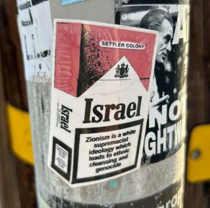 A picture of a poster that says "settler colony Israel / Zionism is a white supremacist ideology which leads to ethnic cleansing and genocide"