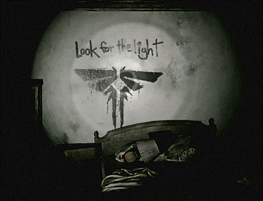 "Look for the light," the motto of the Fireflies, is revealed by torchlight above the headboard of a bed.