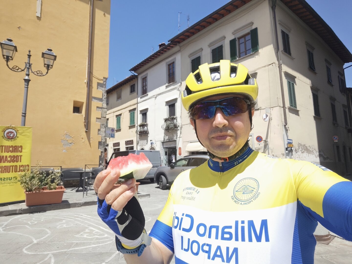 Myself at the arrival eating a watermelon slice