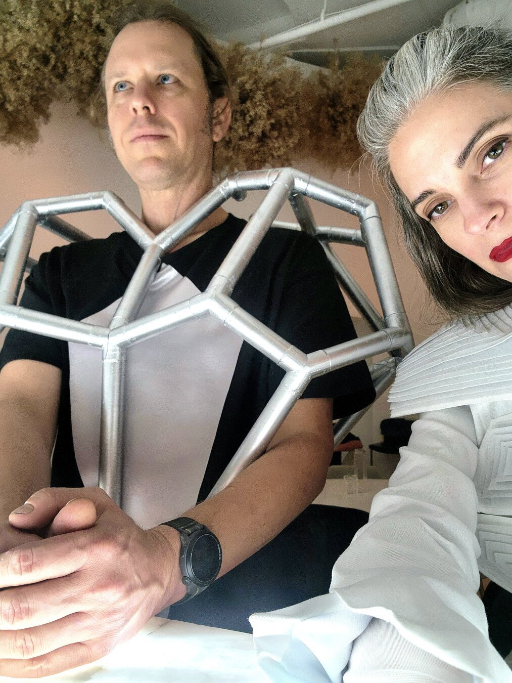 Duane has become one with the Geoheart Pendant. He wears a larger-than-life PVC version of Xover0's iconic heart-shaped necklace. Katherine wears her handmade Dr. Cable costume. More details can be found in our previous posts.