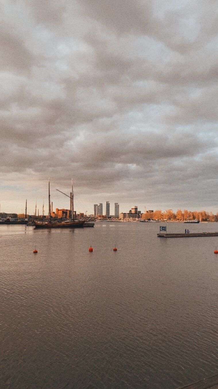 Ship &amp; Ocean. Really behind is the part of city