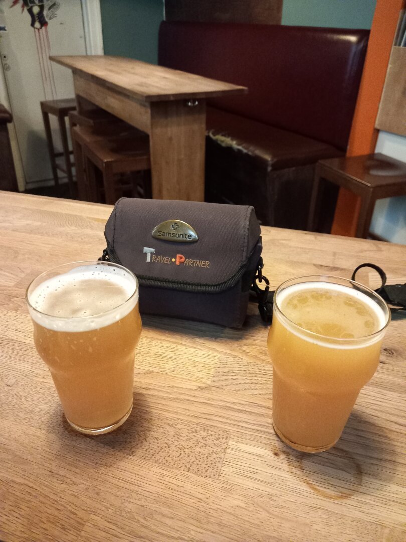 Two and a pocket bag with a written Travel partner text.