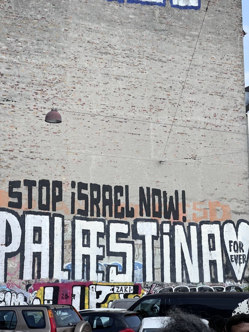 Graffiti on wall saying ”stop Israel now! Palestine for ever”