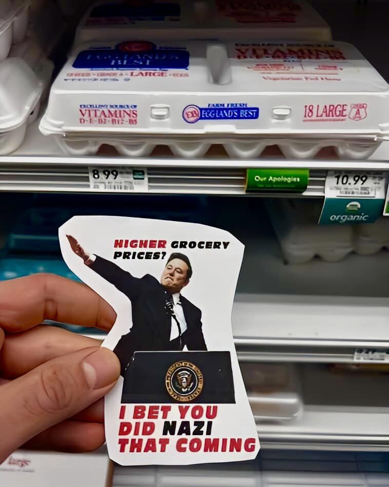 stickers pointing out the rising prices