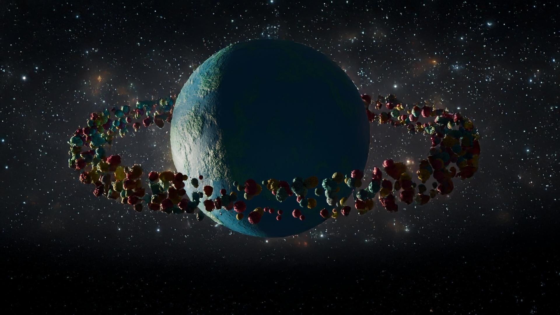 Photorealistic 3D model of a planet surrounded by colourful asteroids.