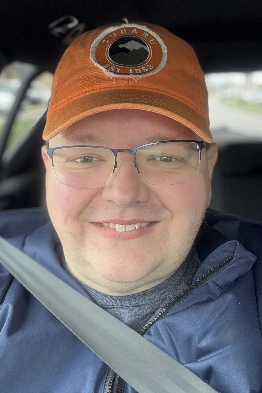 Self portrait of Caucasian man with glasses.