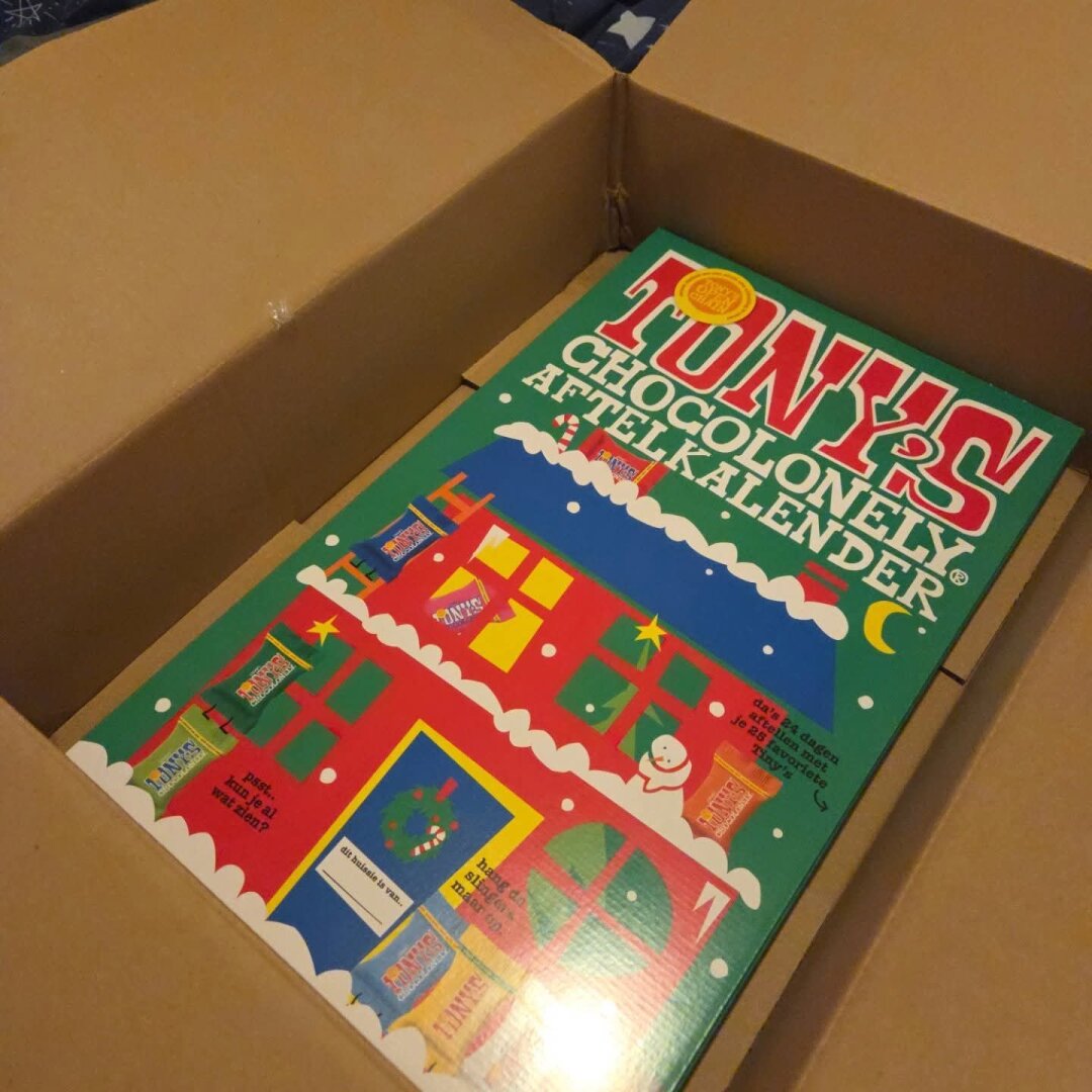 a huge cardboard box with a huge Tony's Chocolonely advent calendar in it