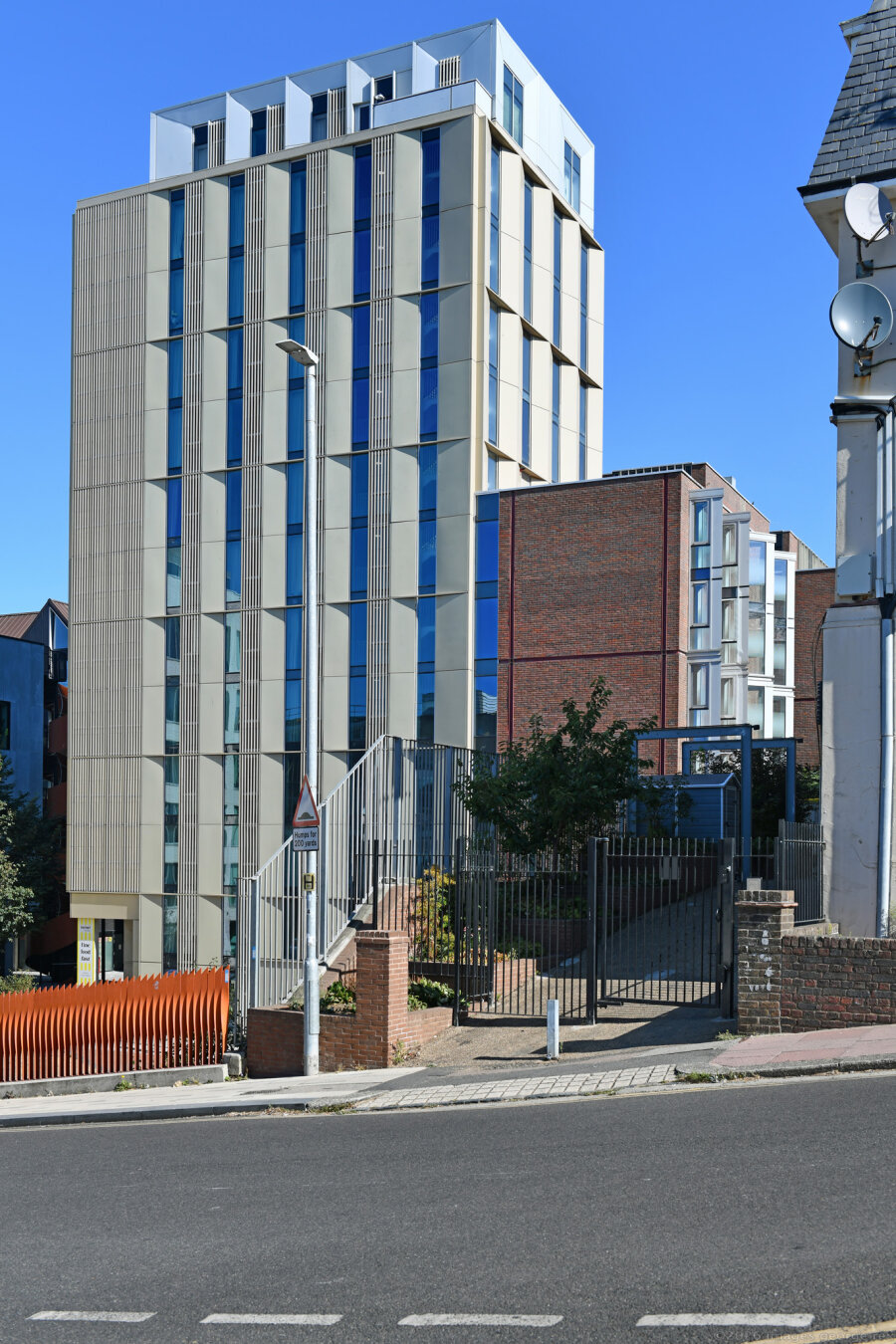 Photo showing the tallest block of a mix of private residential, affordable and student apartments on the site of the former Circus Street Municipal Market. City of Brighton & Hove, UK.