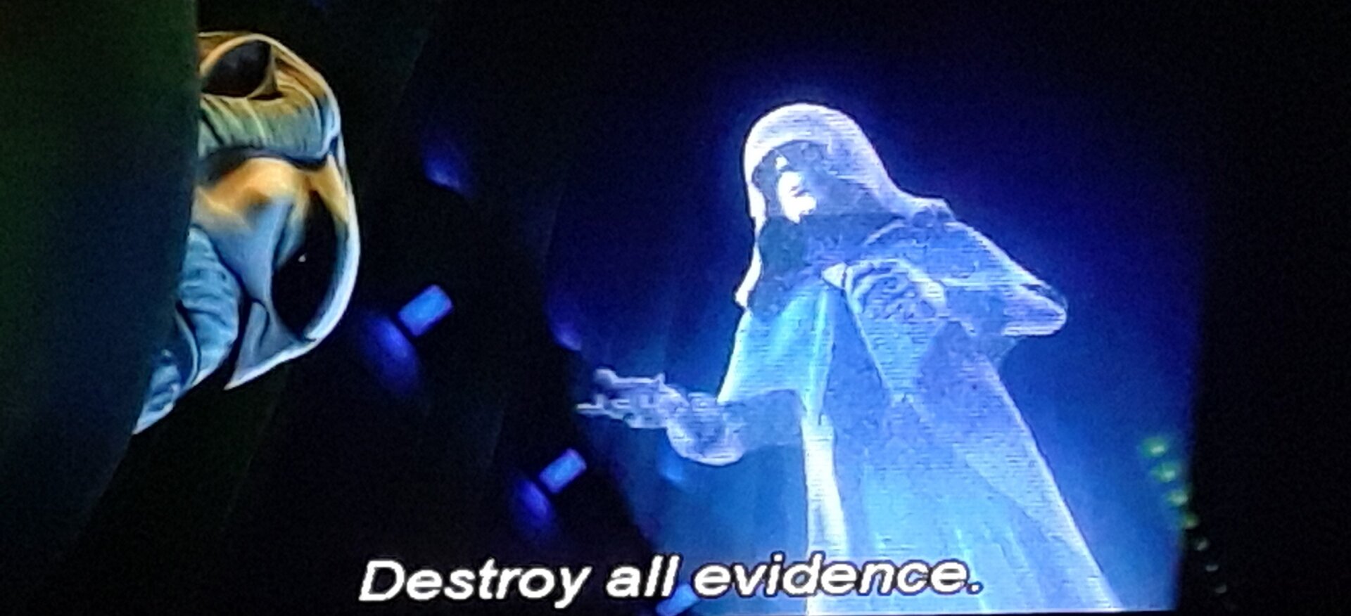 A medical diagram is shown, with a tumor highlighted in a head of a clone. The text on the screen reads: "I have never witnesses anything like this in your kind."