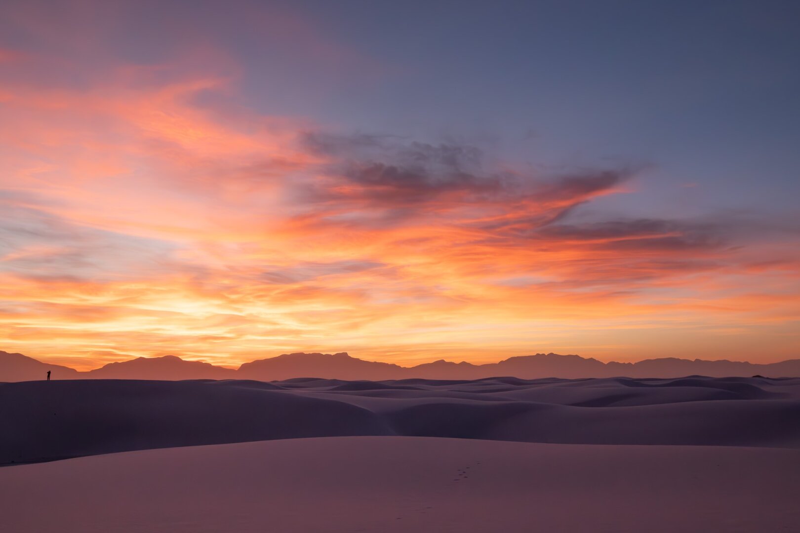 A colorful sunset over the dunes at White Sands, New Mexico