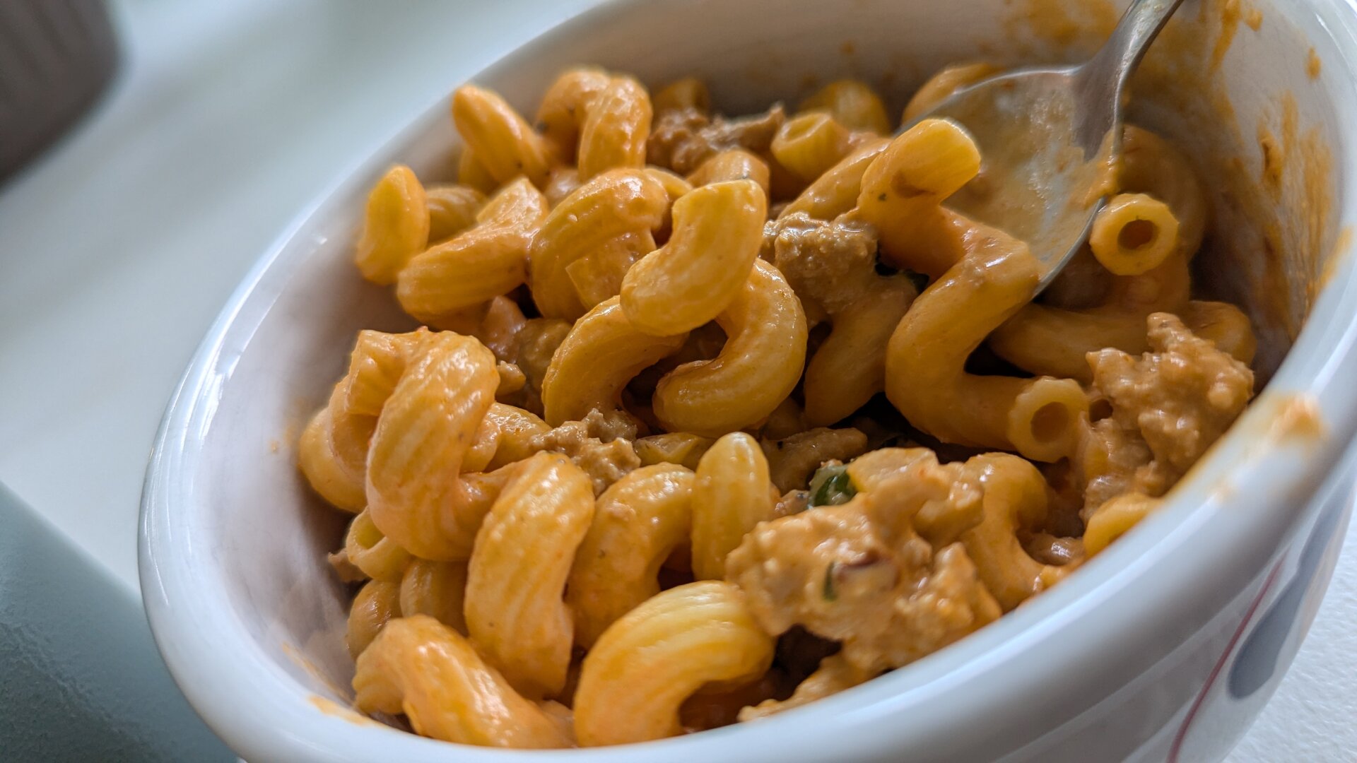 spicy vodka sauce pasta with ground turkey and fresh basil served over cavatappi