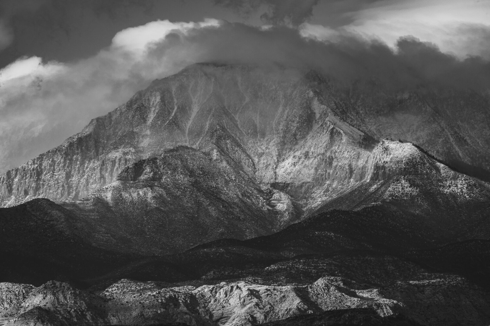 Mountains emerging from clouds after a recent storm.