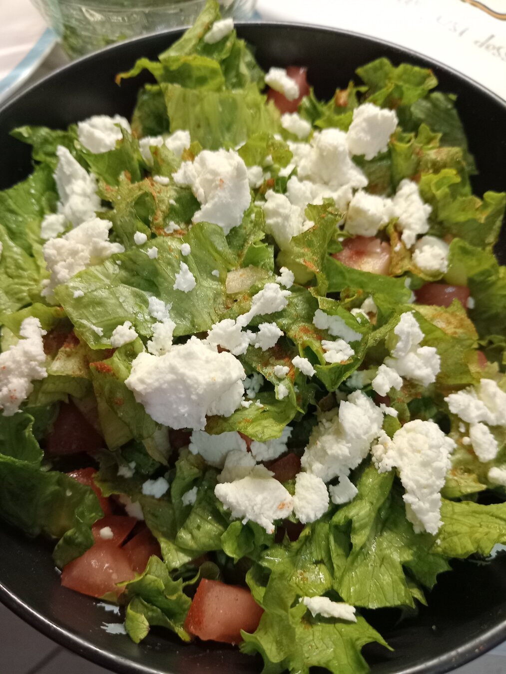 greek salad (lettuce, tomatoes, feta cheese, fresh cilantro)