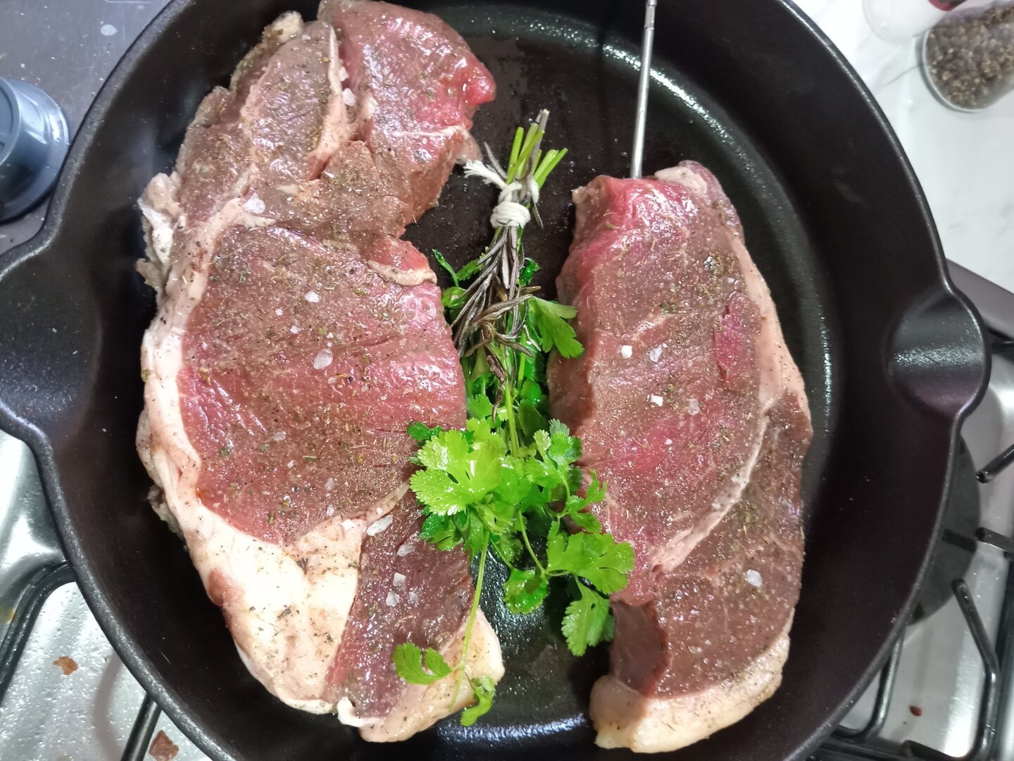 2 Steaks on an iron skillet