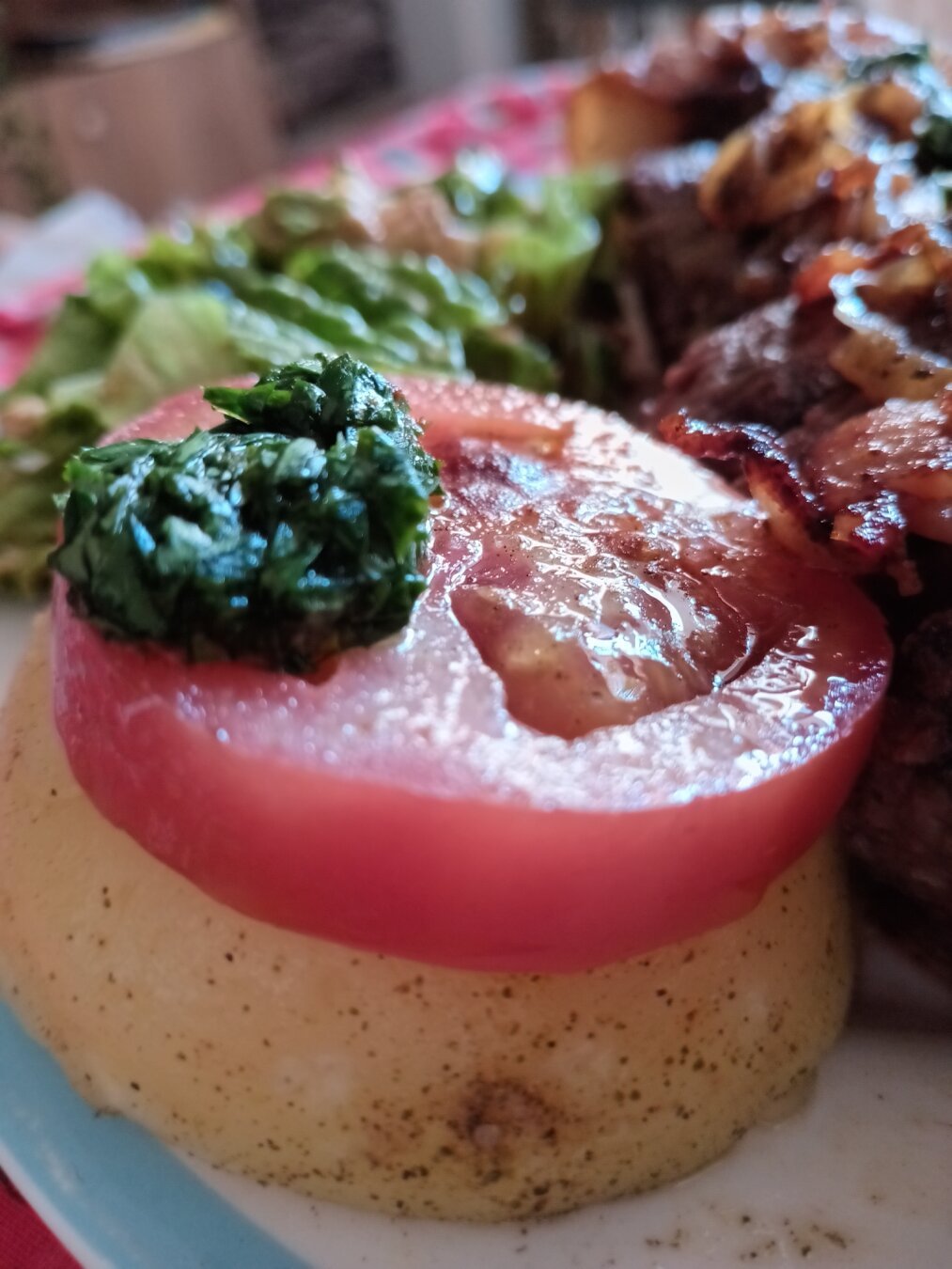 Provoleta with tomato and chimichurri