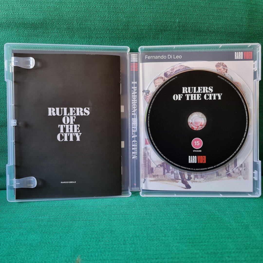 Opened up scanavo packaging, shwoing the booklet as well as the disc