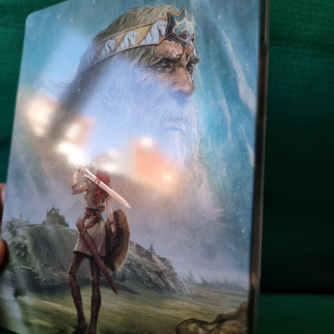 Angled front view of steelbook to showcase the metalic effects