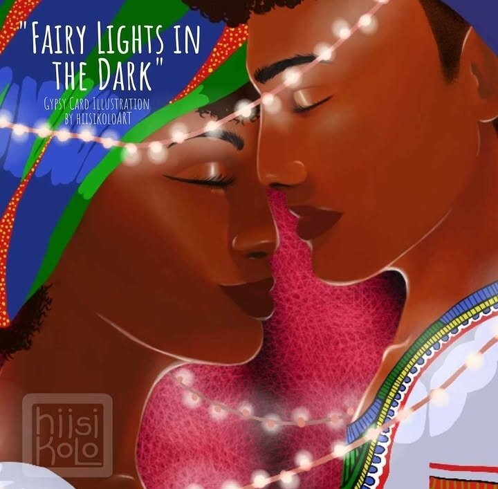 Semi-realistic digital painting of a POC couple holding each other close, goreheads slightly touching, eyes closed, as they smile contently. The woman of the couple has darker skin, and a flat-colored head wrap that is blue, orange, and green. Her natural, curly hair is peeking from under the wrap. She is wearing a white shirt.

The man has a lighter skin and he is wearing a blue hat over his natural, short cut hair peeking under it. He is wwaring a whitw shirt with green, blue and orange embroidery  around the collar and short sleeve. 

Behind them is a pink, folding fabric, and around them are fairy lights that hang over their bodies.

Text reads "Fairy lights in the dark"
"Gypsy card illustration by hiisikoloART"