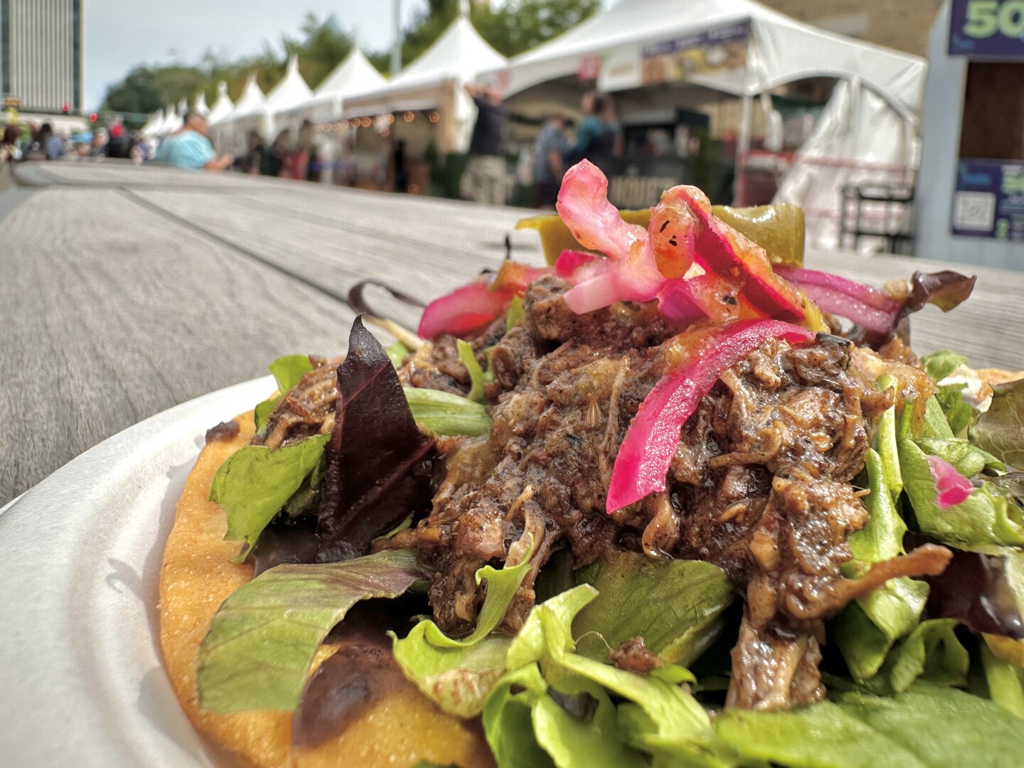 Food photo of a very tasty tostada de birria, shot early before the crowds took over!