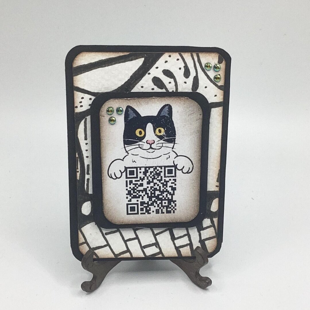 A fun little atc card using watercolour and pen. It has a QR code going to a video.