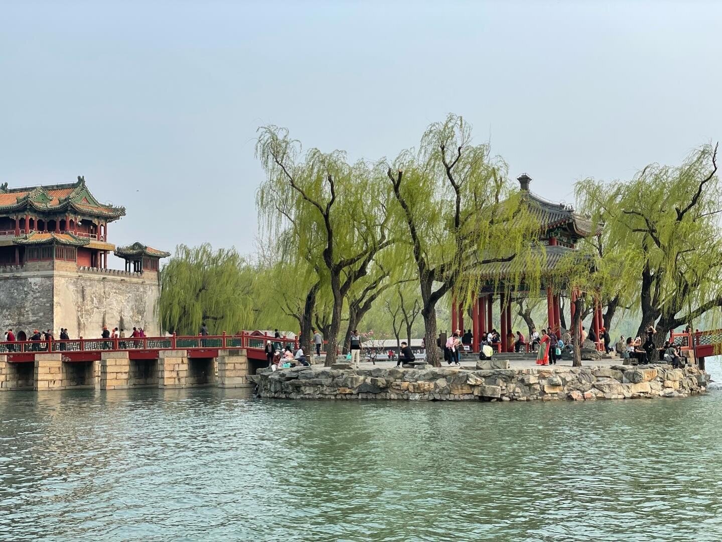A building near the edge of a lake.