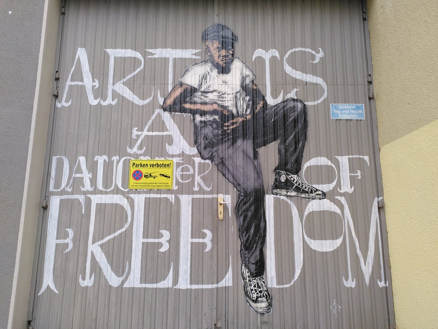 Art is a daughter of freedom.☺️

A black, young man with a white T-shirt and a black trousers sitting on the letters.