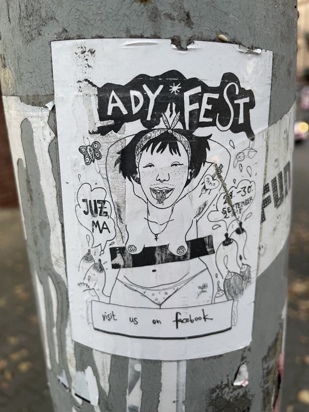 A sticker I one made: a girl whose tits are hanging out, breasts spilling milk and vulva butterflies in the sky.