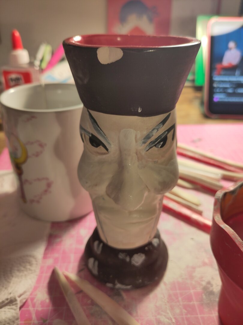 The same vase that was altered because it initially reproduced anti-Asian racist stereotypes.