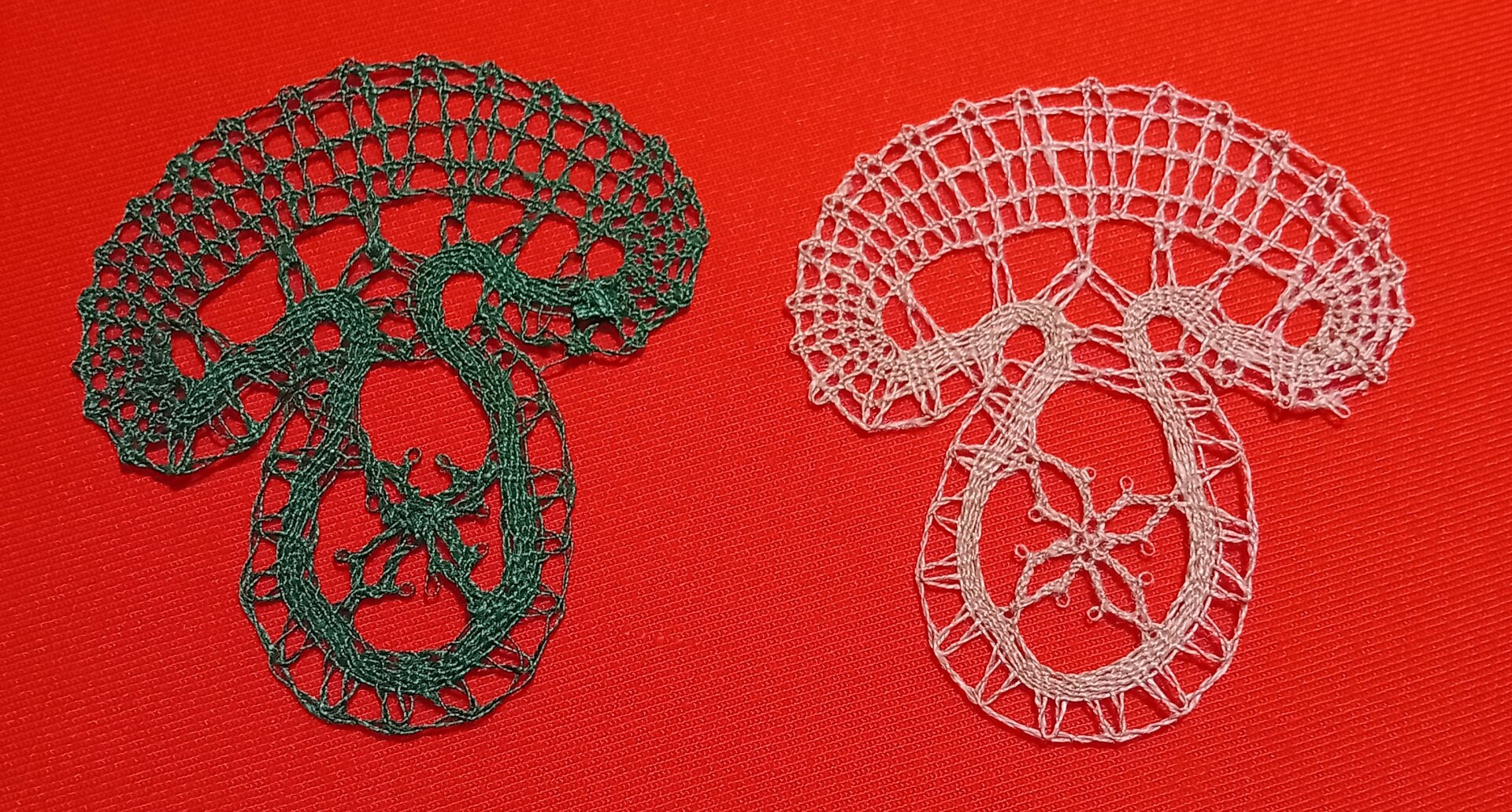 Two bobbin lace pieces looking like mushrooms