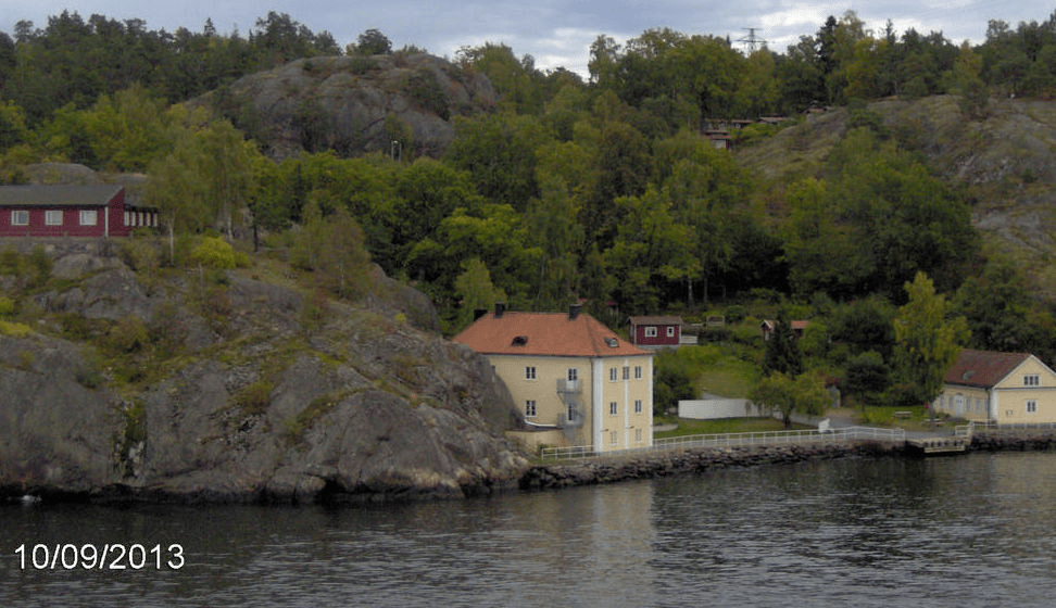Homes on forested rocky island