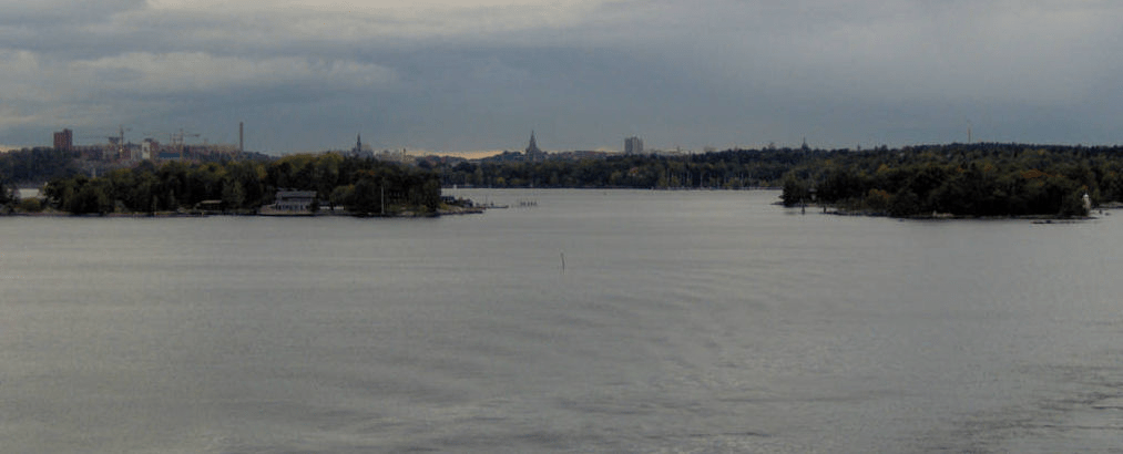 Islands with homes and docks in the Bay and mainland Stockholm further away