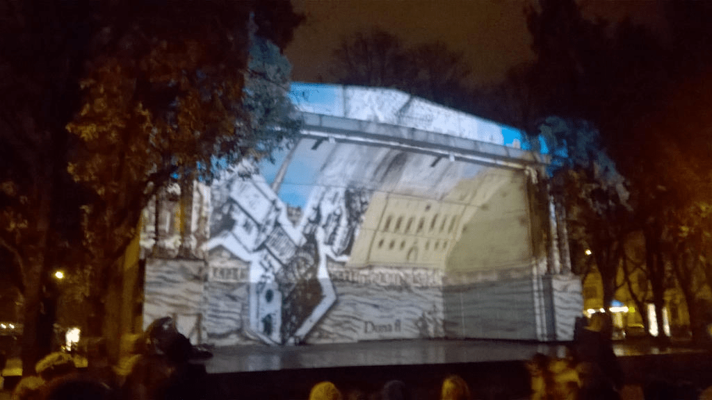 The stage in Vermanes Garden, now used as a big screen for a projector