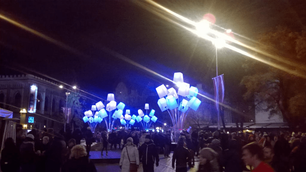 Light art installations in form of flowers, located in Livu Square