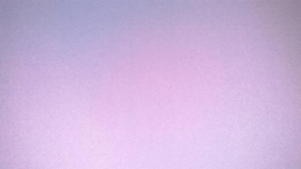 Photo of the sky, dusted pink by the setting sun with some blue in the corners