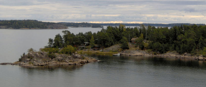 Couple of homes with docks on a small island