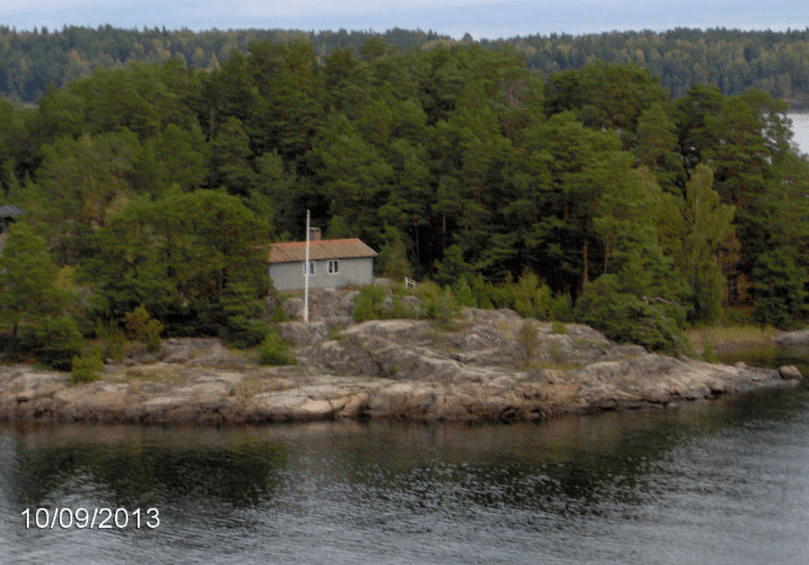 Small home on a small forested stone island