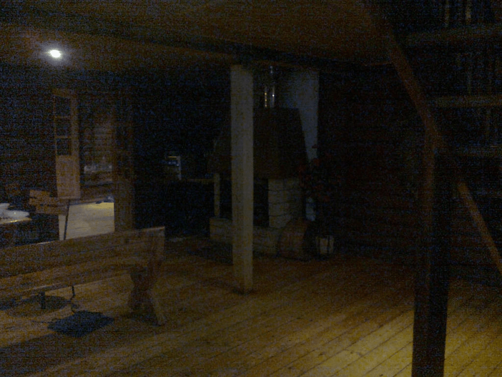 Other part of the room, with a furnace in the shadowed part of the room