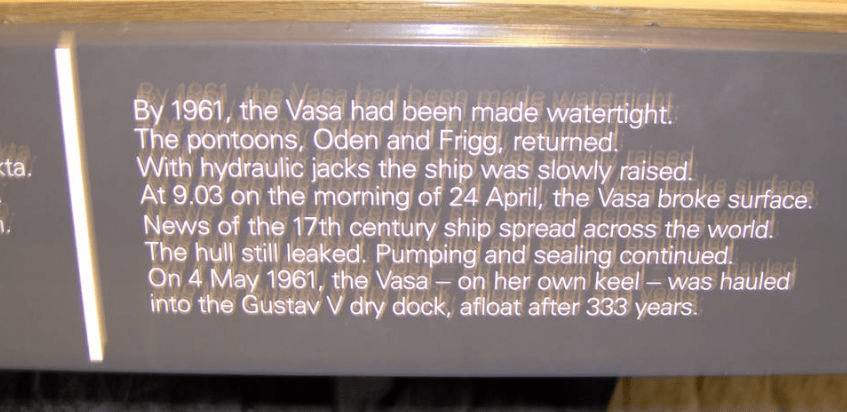 Blurry photo of the sign explaining about the ship that raised the Vasa and steps taken after she was freed from her watery grave