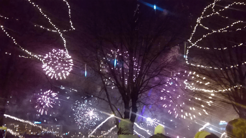 Purple and golden fireworks in clusters