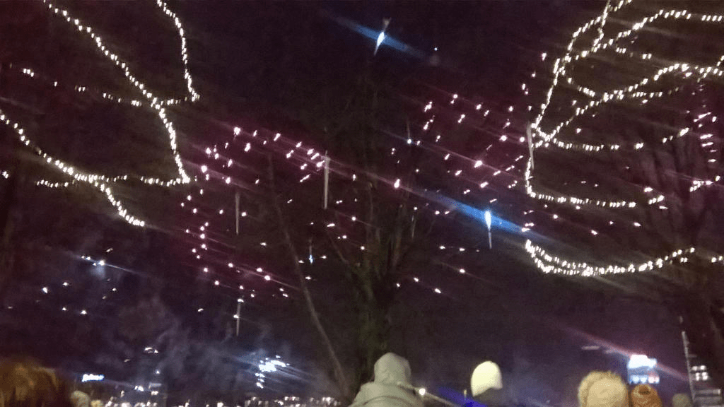 Red fireworks fizzling in the sky