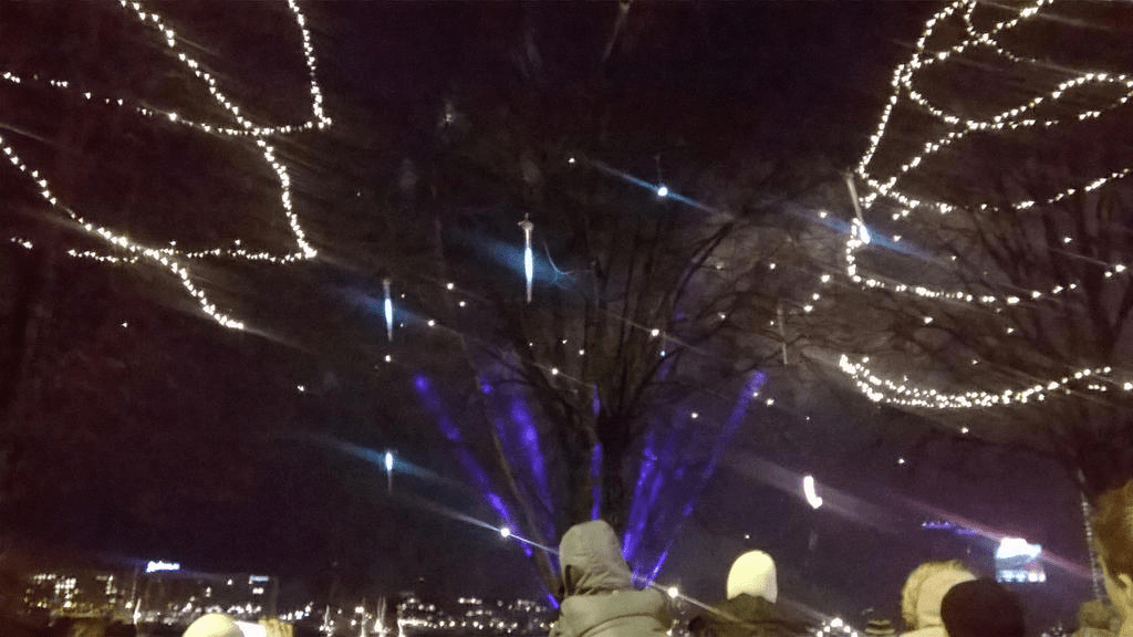Blue beams of light are lighting up the sky