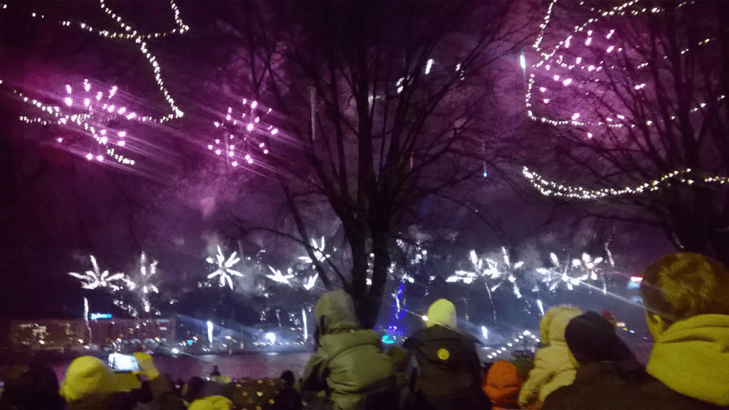 Bright and pink-ish fireworks in the sky