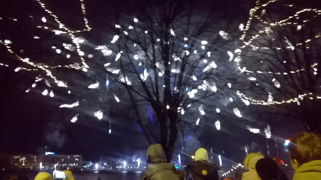 Shaky photo of bright fireworks fizzling out