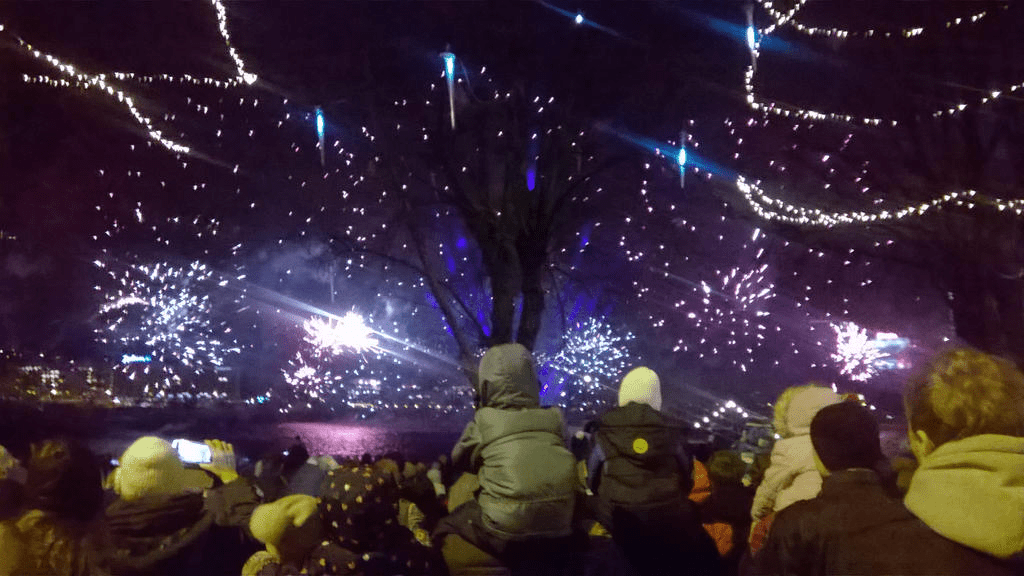 Blue and purple fireworks lighting up the sky
