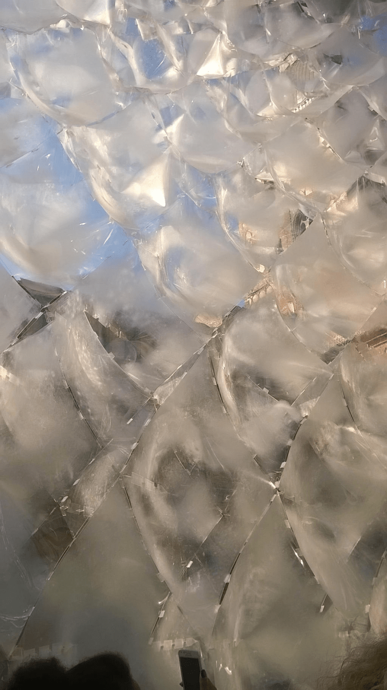 Plastic walls of the Iceberg art installation, coated to look like ice