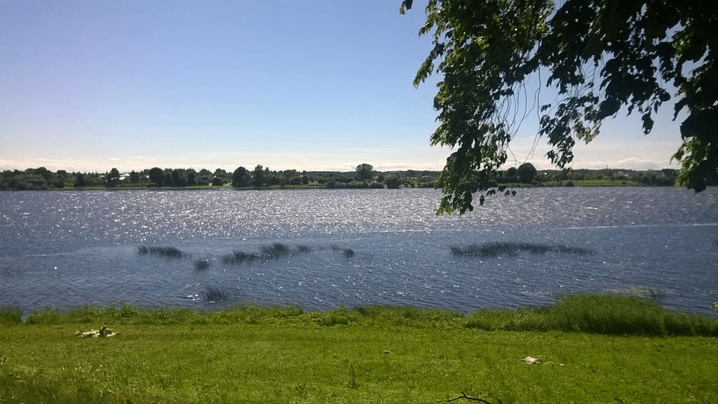 Photo of the river Daugava taken during a sunny summer day.