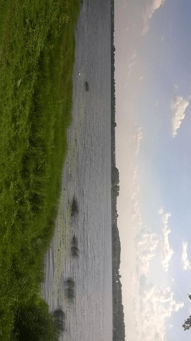 Portait view of the Daugava river by the promenade