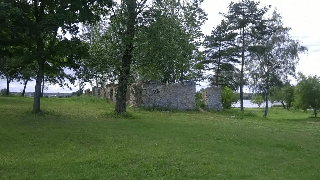 Ruins of a home, atop a small hill by the Daugava